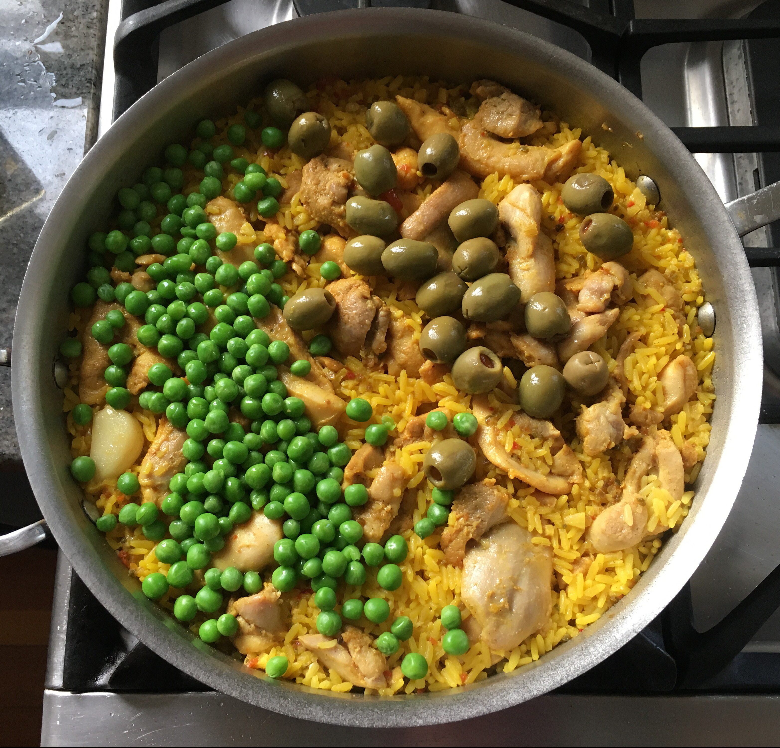 Picture Brazilian style chicken & rice with peas & olives.