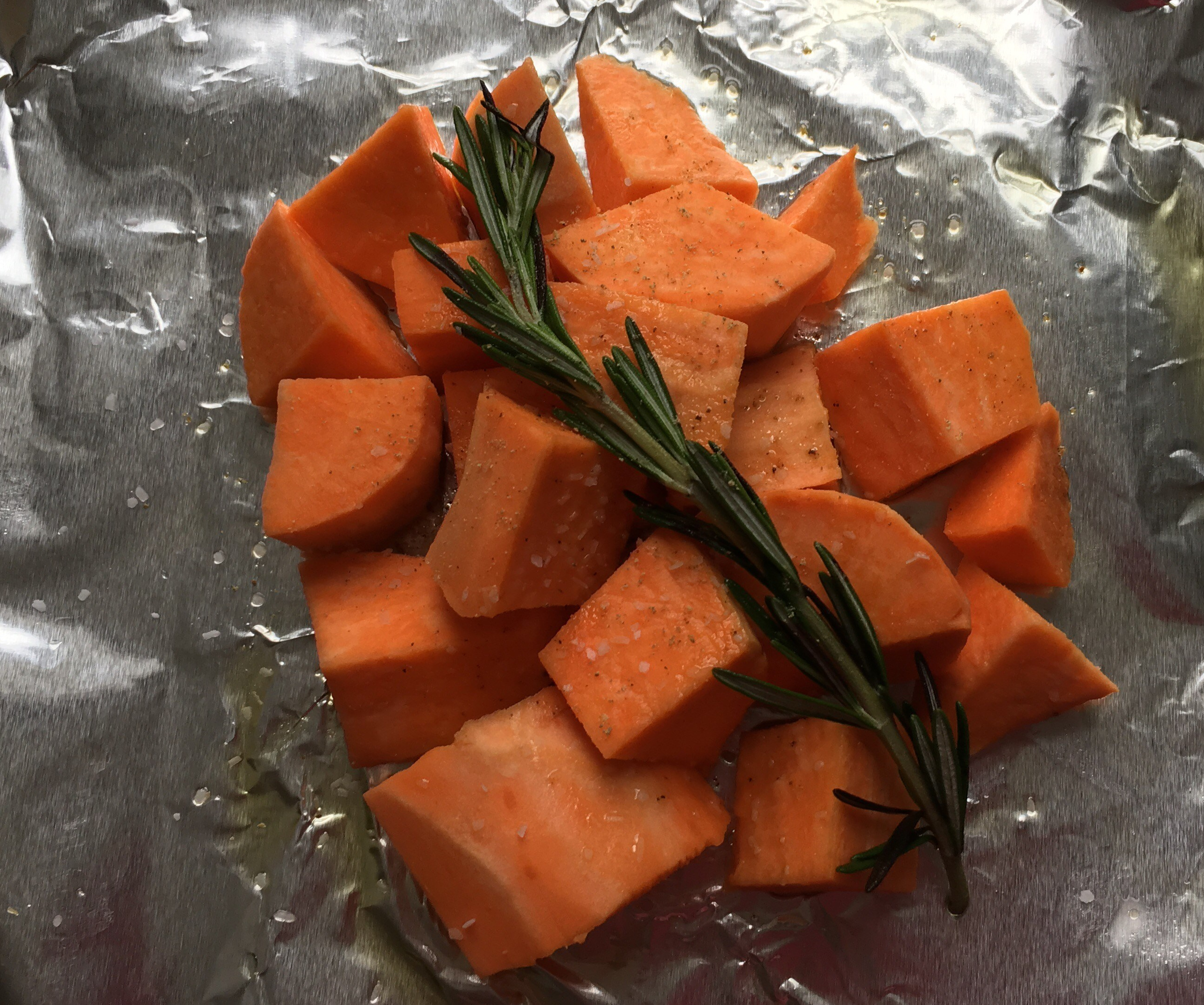 Rosemary, sweet potato, salt, pepper & olive oil.