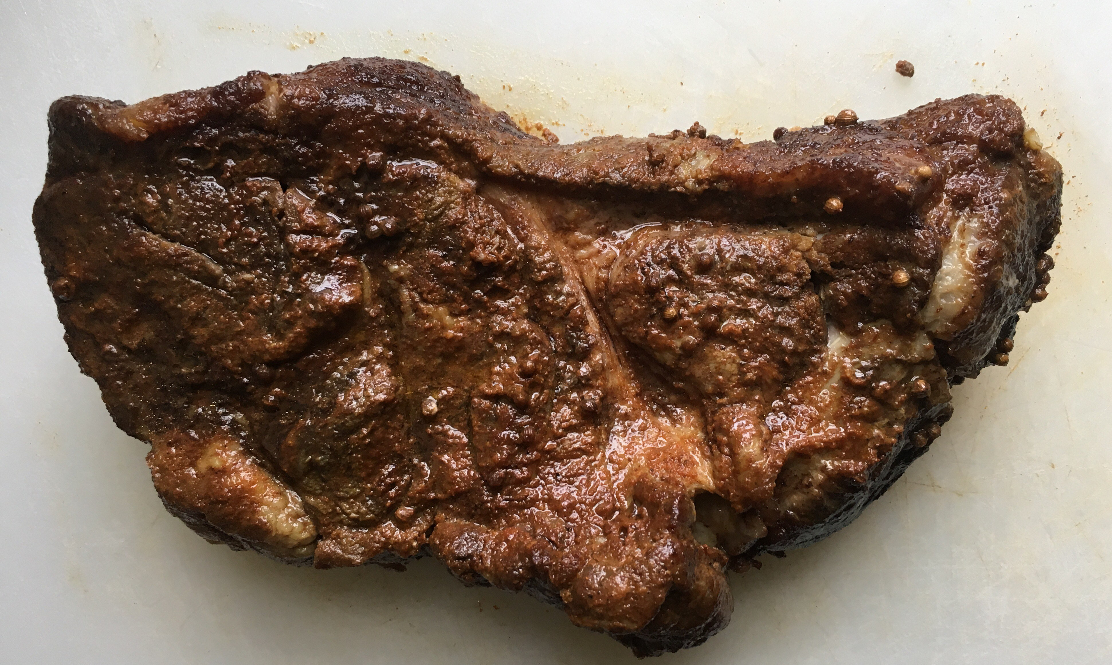 Slow cooked BBQ pork shoulder ready to carve