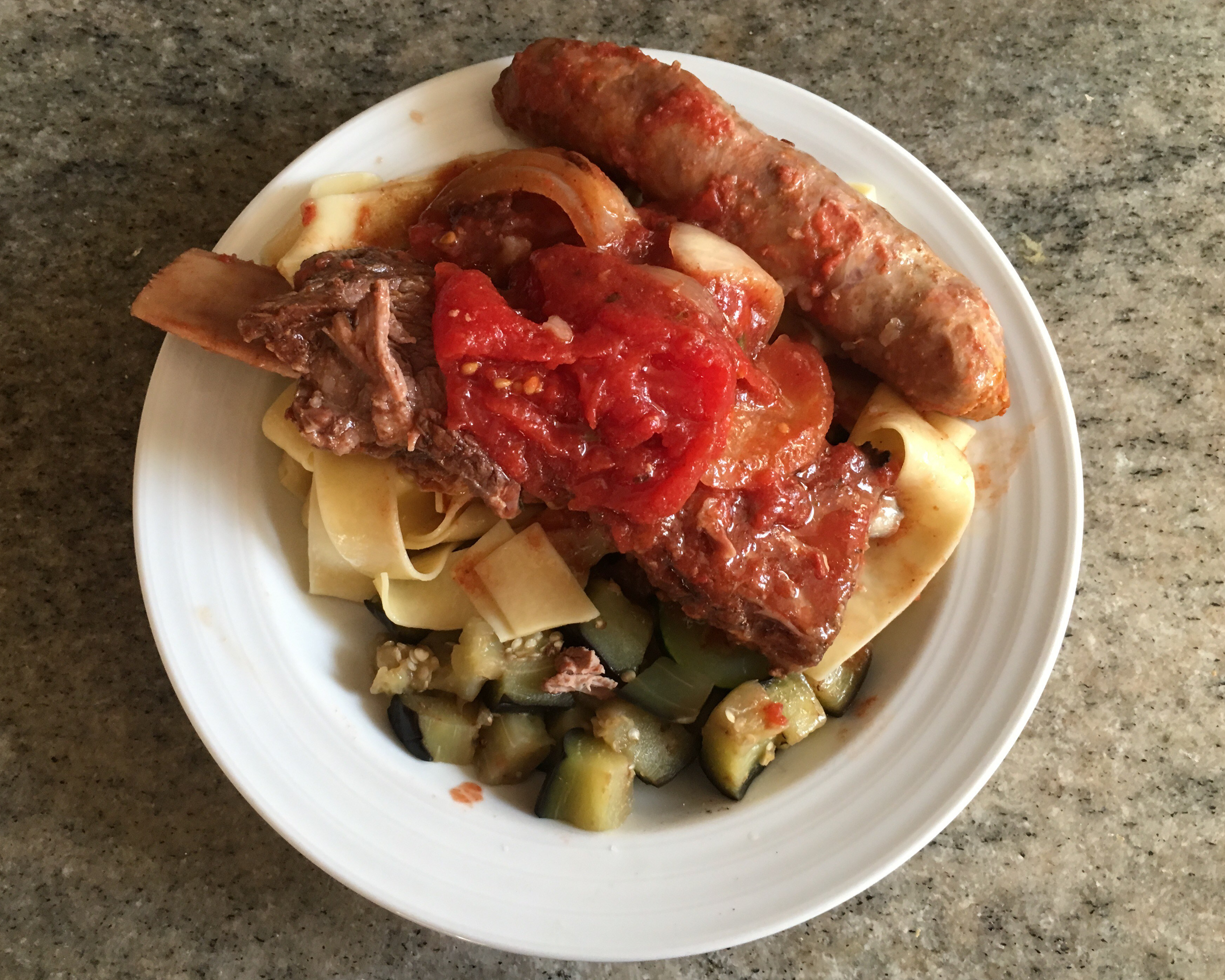 Picture of Sunday sauce over pappardelle noodles