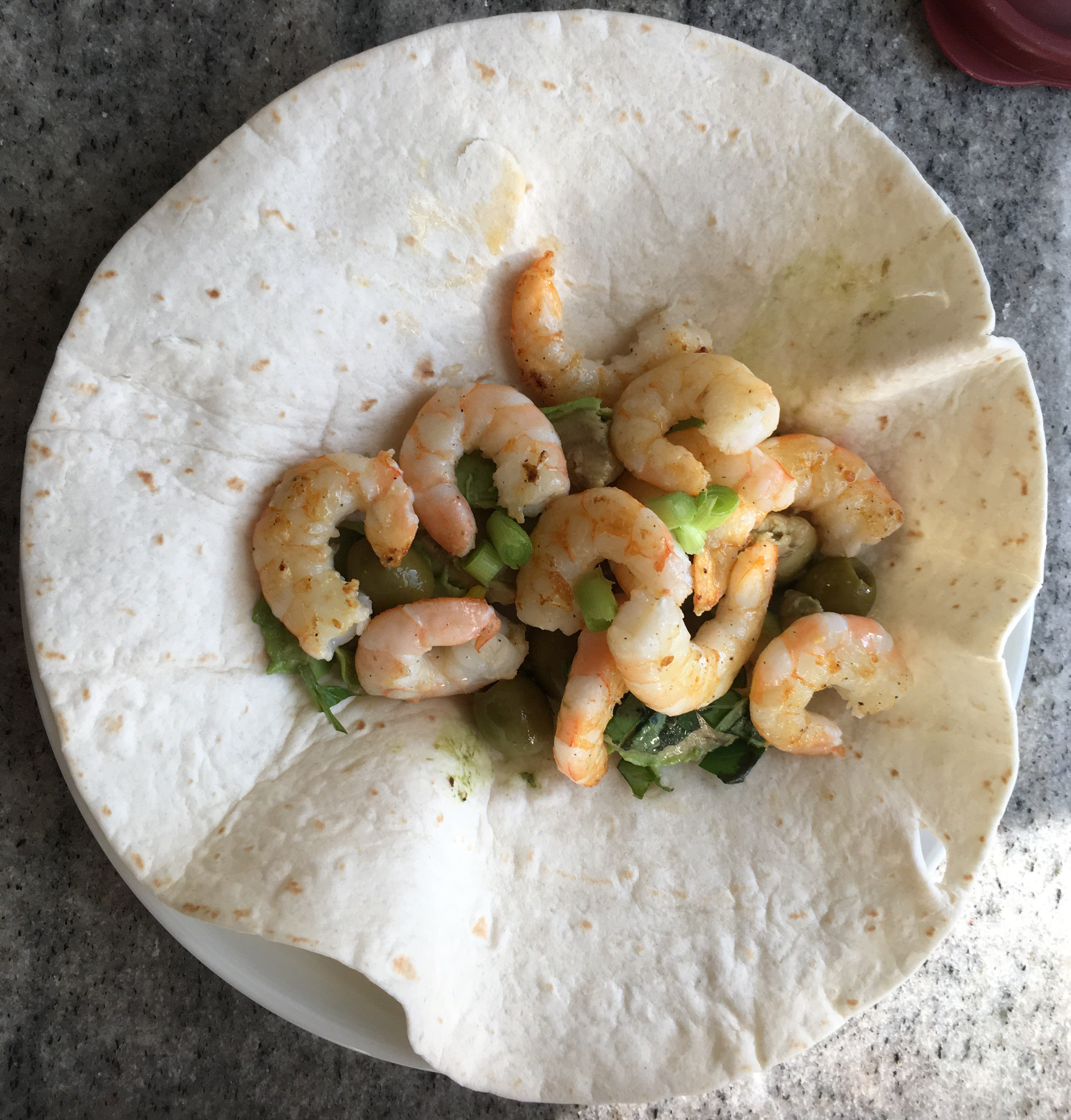 Shrimp, avocado, green garlic, basil burritos.