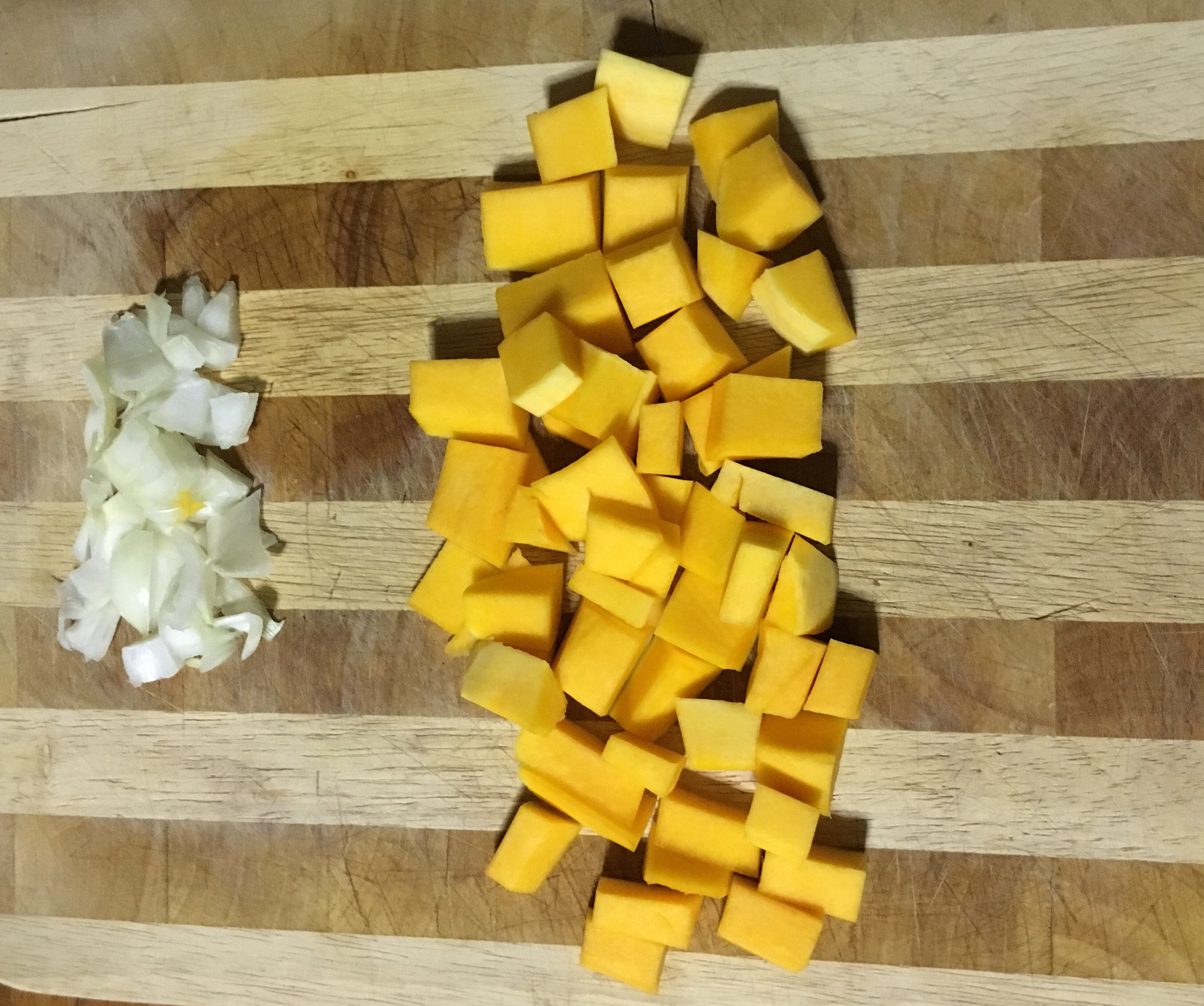 Sliced butternut squash and onion.