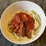 Picture of Tomato sauce with rosemary, garlic & short ribs over pasta