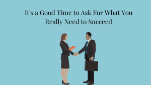 Image of a woman dressed in a business suit shaking hands with a man also dressed in a suit