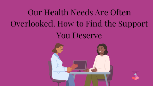 A woman sitting across a table from her doctor