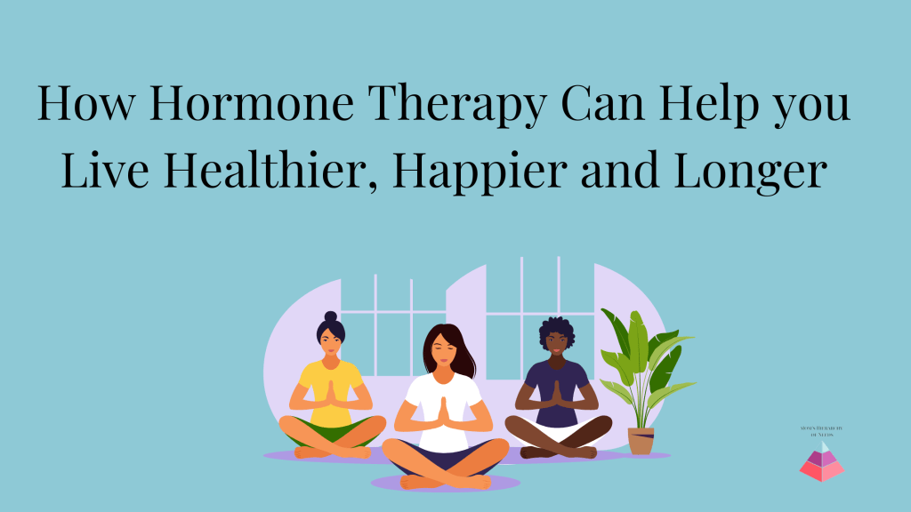 Image of three women sitting practicing yoga together